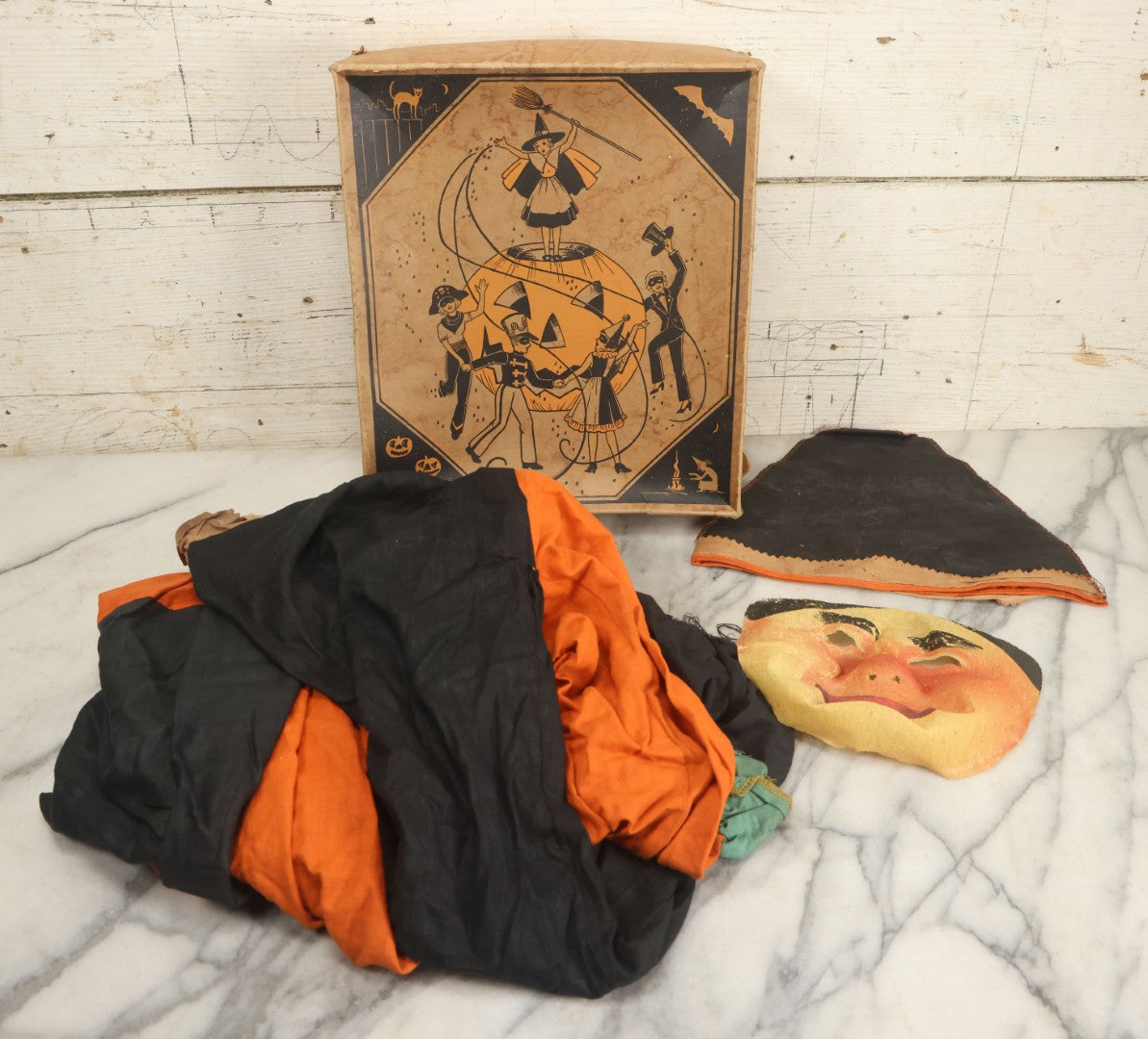 Lot 006 - Vintage Masquerade Halloween Costume In Cardboard Box With Halloween Party, Witch Graphics, Including Mask, Hat, And Costume
