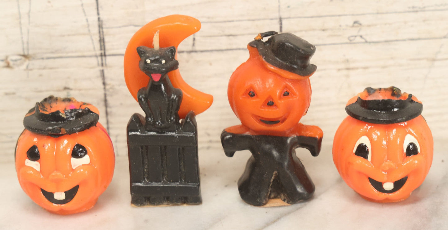 Lot 113 - Grouping Of Four Vintage Halloween Wax Candle Figures, Including Cat In Front Of Moon On Fence, Pumpkin Man, Both By Gurley Novelty Co., Buffalo, New York, And Remnants Of Two Other Pumpkin Candles
