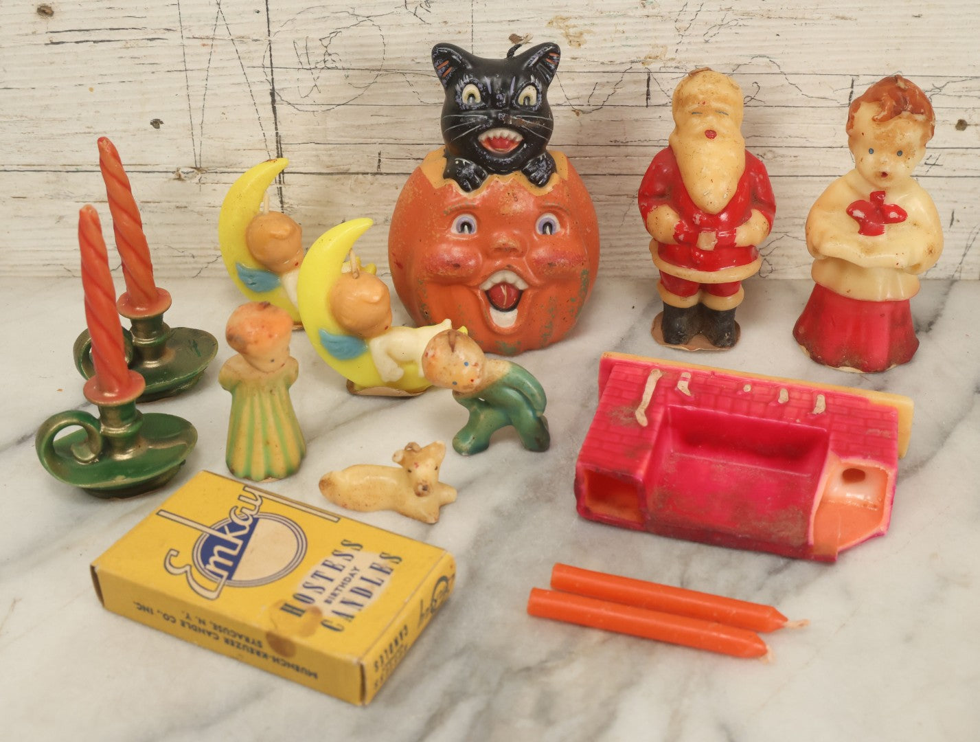 Lot 114 - Grouping Of 10+ Vintage Holiday Candles Including Santa Claus, Carolers, Modern Pumpkin Candle, Others