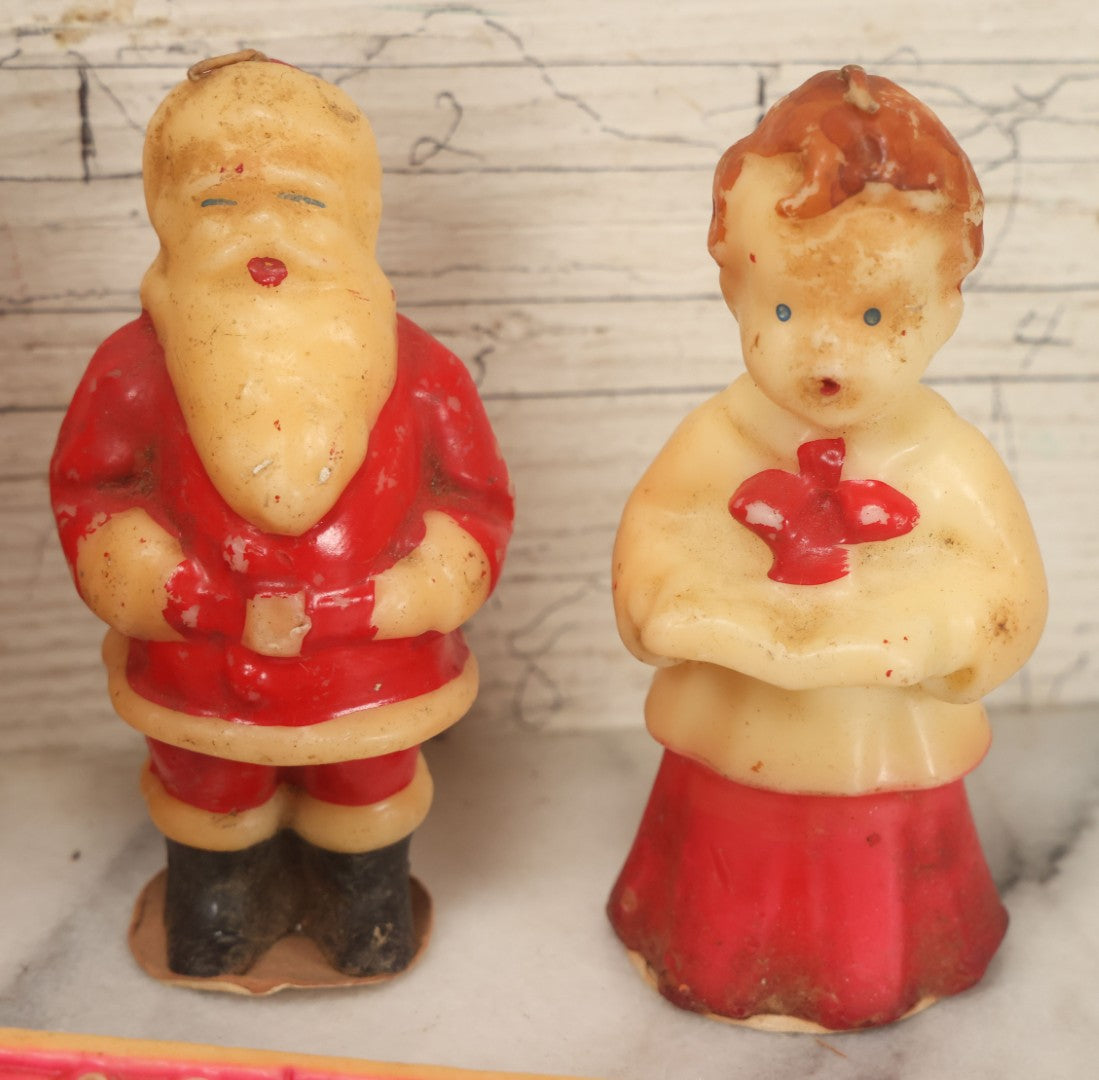 Lot 114 - Grouping Of 10+ Vintage Holiday Candles Including Santa Claus, Carolers, Modern Pumpkin Candle, Others