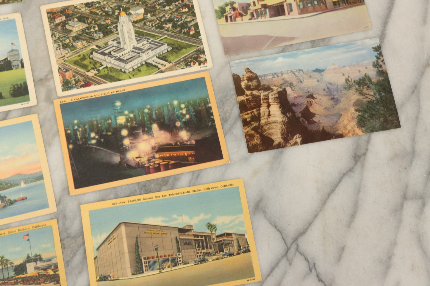 Lot 123 - Grouping Of Fourteen Vintage Souvenir Postcards From Midwestern And Western United States, Including Missouri, Indiana, California, New Mexico, Nebraska, Arizona, And Wyoming