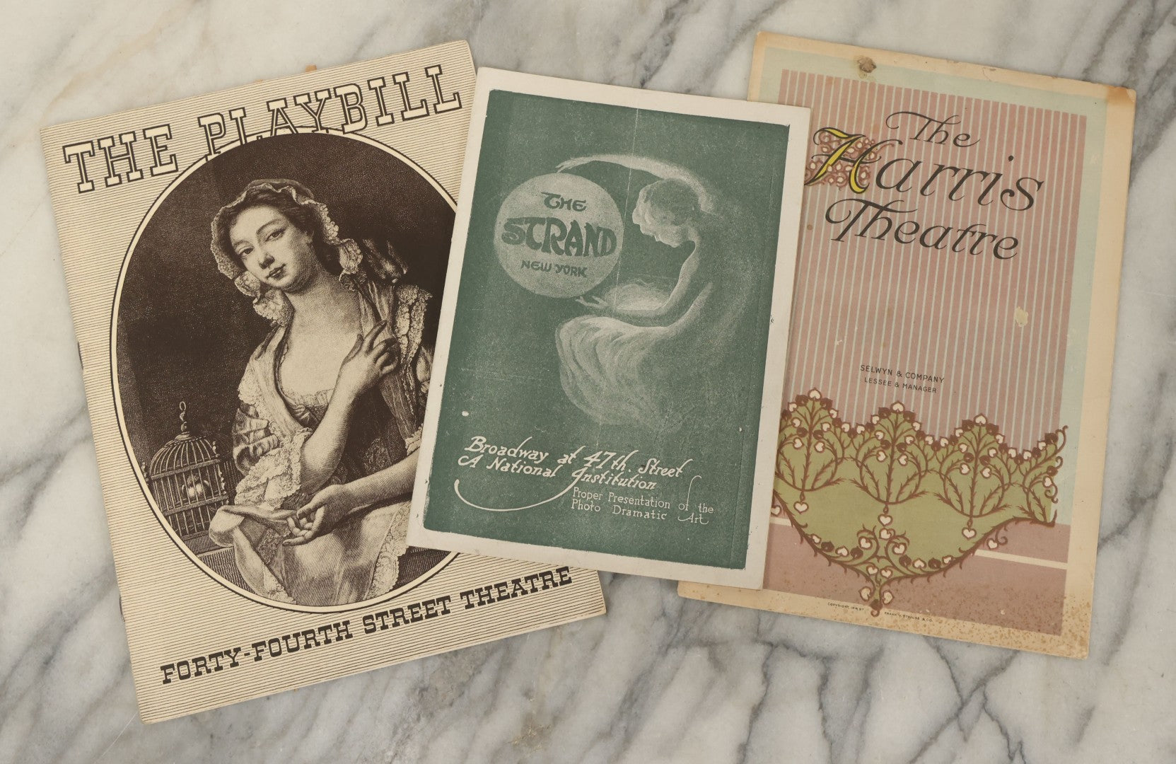 Lot 140 - Grouping Of Three Antique And Vintage Theater Playbills Including The Strand Theater, The Harris Theater, And Forty-Fourth Street Theatre, New York City