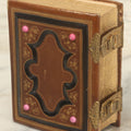 Lot 016 - Antique Victorian Family Photo Album With Pink Painted Milk Glass Decorations And Debossed Fore-Edge Decoration, Containing 9 Tintypes, 18 Carte De Visite C.D.V. Photographs, And 7 C.D.V. Illustrated Album Filler Cards