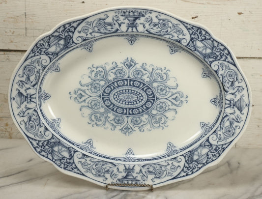 Lot 064 - Vintage Wedgwood Neoclassical Revival Transferware Platter With Griffin Motif, Greco-Roman Architectural Elements, Urns, Circa 1932, 17-1/4" x 13-1/2"