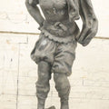 Lot 035 - Antique Spelter Metal Soldier Statue, Wearing Armor And Helmet, Note Missing Arm, Damaged / Warped Based, Overall Poor Condition, 16-1/2" Height