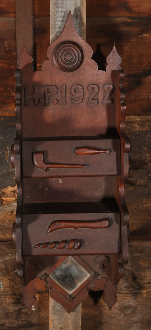 Antique Folk Art Genleman's Parlor Smoking Shelf, Hand Cut And Carved Wood Details, Initialed And Dated "H.P. 1922" At Top, Pipe, Smoking Tools, And Club Card Suite Carvings, Hinged Compartments, Mirror