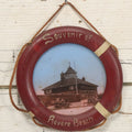 Lot 101 - Antique Souvenir Of Revere Beach, Massachusetts, With Photo Of Bath House And Automobile, In Hand Painted Life Preserver Frame With Rope Embellishments