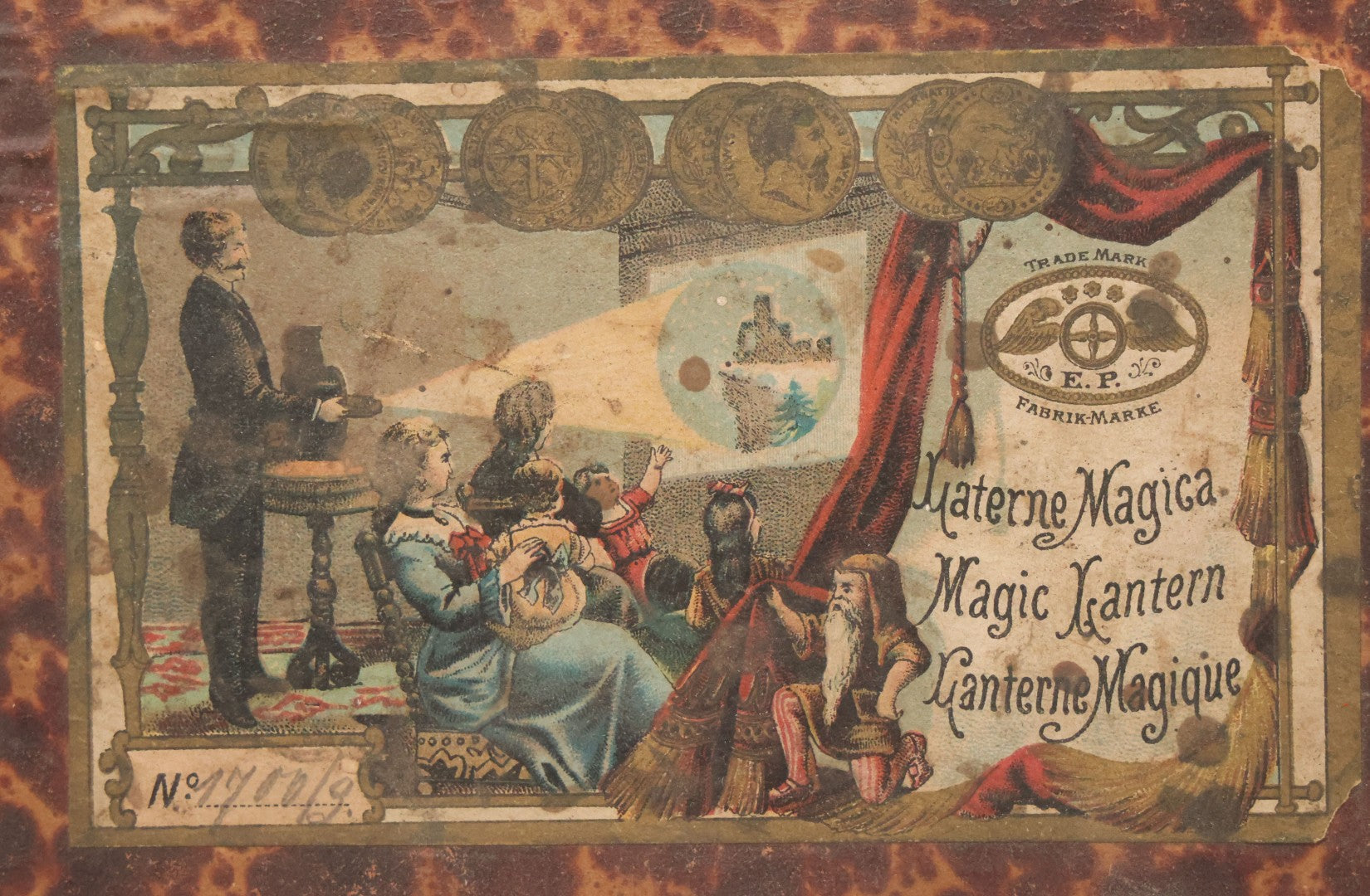 Lot 005 - Antique Magic Lantern Projector In Original Box With Eleven Slides, On Base With Storage Compartment, Original Paper Label Instructions, By Ernst Plank Company, Nuremberg, Germany, Note Missing Metal Chimney