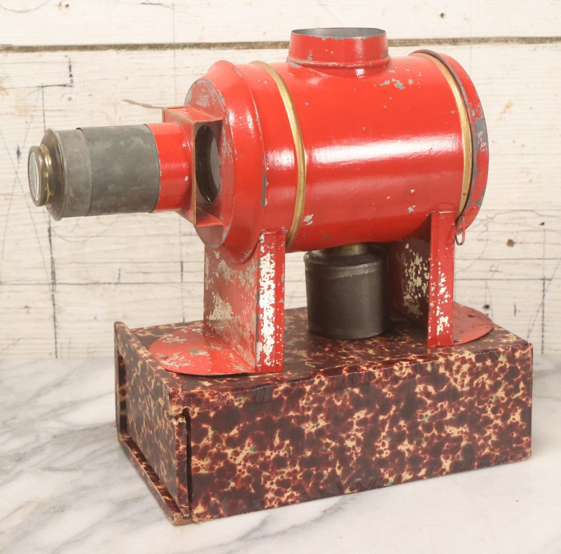 Lot 005 - Antique Magic Lantern Projector In Original Box With Eleven Slides, On Base With Storage Compartment, Original Paper Label Instructions, By Ernst Plank Company, Nuremberg, Germany, Note Missing Metal Chimney