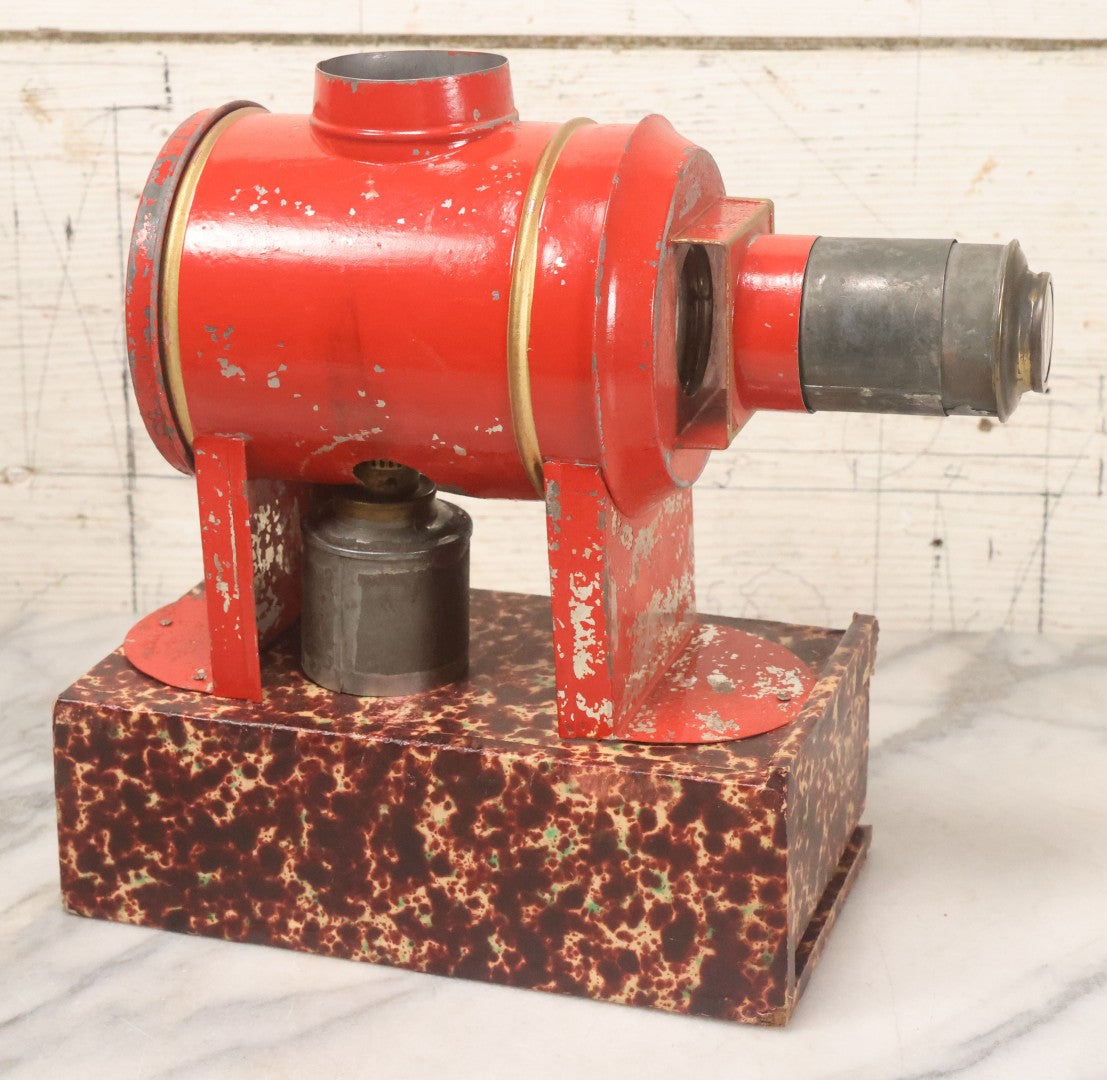 Lot 005 - Antique Magic Lantern Projector In Original Box With Eleven Slides, On Base With Storage Compartment, Original Paper Label Instructions, By Ernst Plank Company, Nuremberg, Germany, Note Missing Metal Chimney
