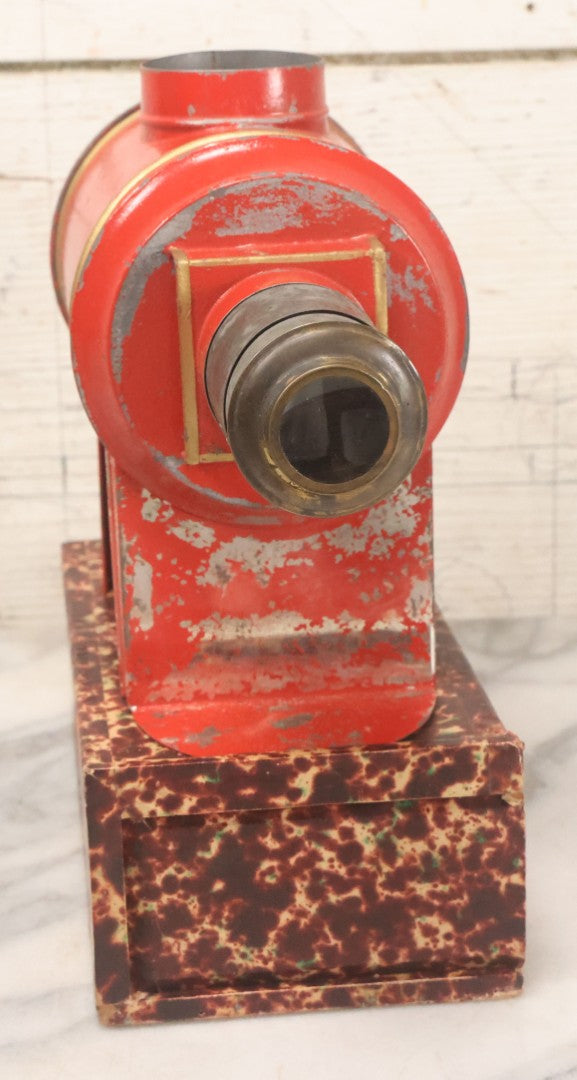 Lot 005 - Antique Magic Lantern Projector In Original Box With Eleven Slides, On Base With Storage Compartment, Original Paper Label Instructions, By Ernst Plank Company, Nuremberg, Germany, Note Missing Metal Chimney
