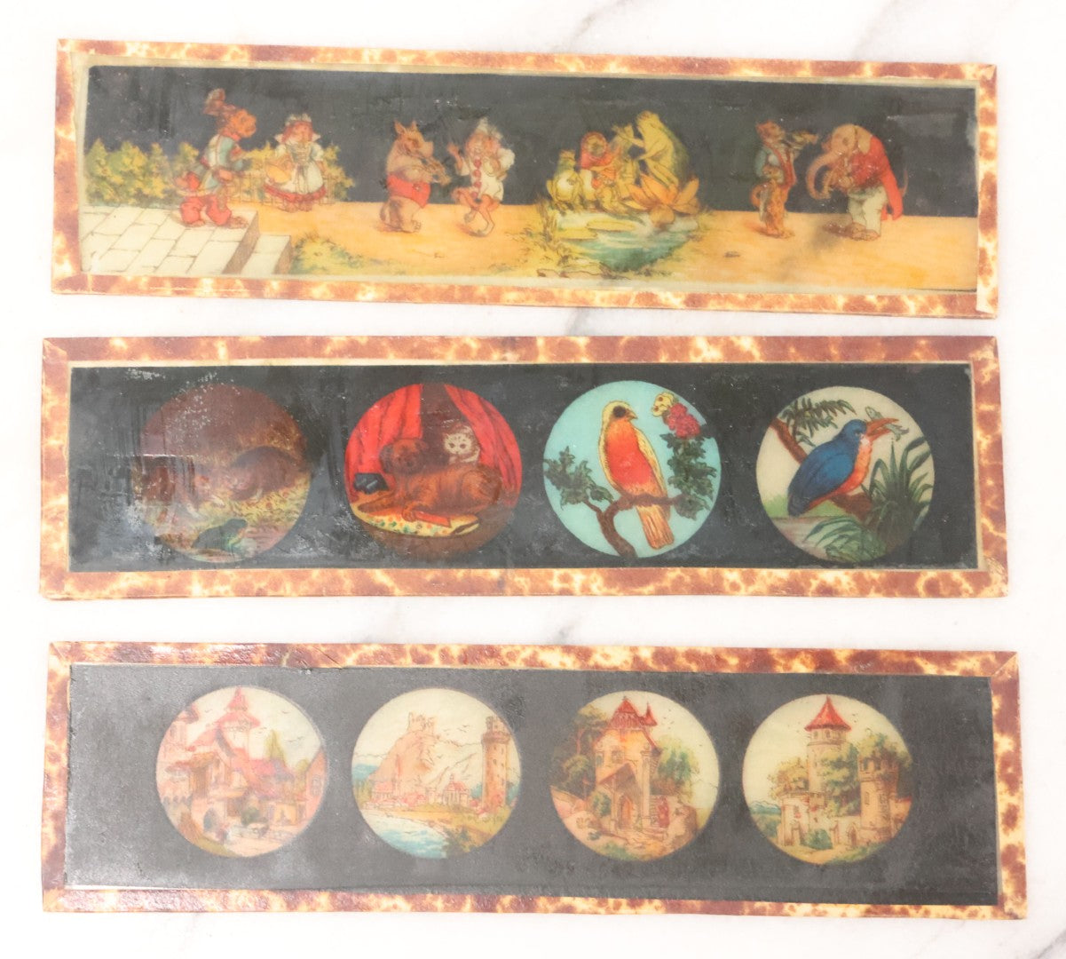 Lot 005 - Antique Magic Lantern Projector In Original Box With Eleven Slides, On Base With Storage Compartment, Original Paper Label Instructions, By Ernst Plank Company, Nuremberg, Germany, Note Missing Metal Chimney