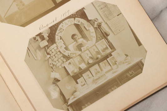 Lot 008 - Antique Snapshot Photo Album Documenting Life In New England, Including Photos Of The Dewey Day Victory Parade In Boston, Views Of Mount Monadnock, Old Orchard Beach, Cats, Dogs, And Interior Photos Including An Early Mirror "Selfie," 1898-1899