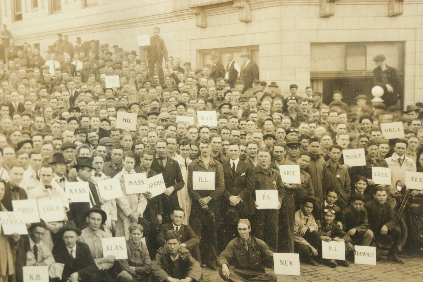Lot 009 - Antique Framed "Yard-Long" Group Photograph Of The Students Of Sweeney Auto School, April 14th, 1921, Photo Taken By Riederer, Kansas City, Missouri, Note Texas Man On Motorcycle, 21" x 9-1/4"