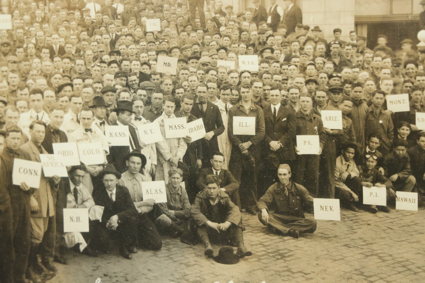 Lot 009 - Antique Framed "Yard-Long" Group Photograph Of The Students Of Sweeney Auto School, April 14th, 1921, Photo Taken By Riederer, Kansas City, Missouri, Note Texas Man On Motorcycle, 21" x 9-1/4"