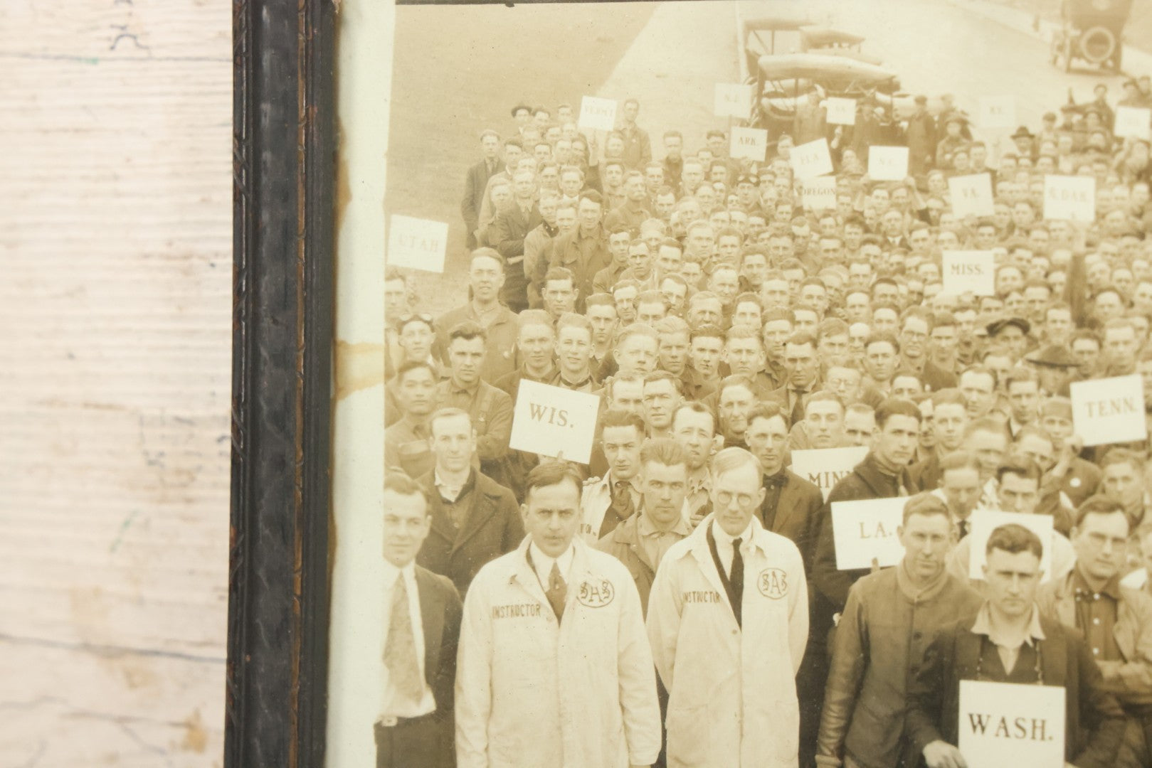 Lot 009 - Antique Framed "Yard-Long" Group Photograph Of The Students Of Sweeney Auto School, April 14th, 1921, Photo Taken By Riederer, Kansas City, Missouri, Note Texas Man On Motorcycle, 21" x 9-1/4"