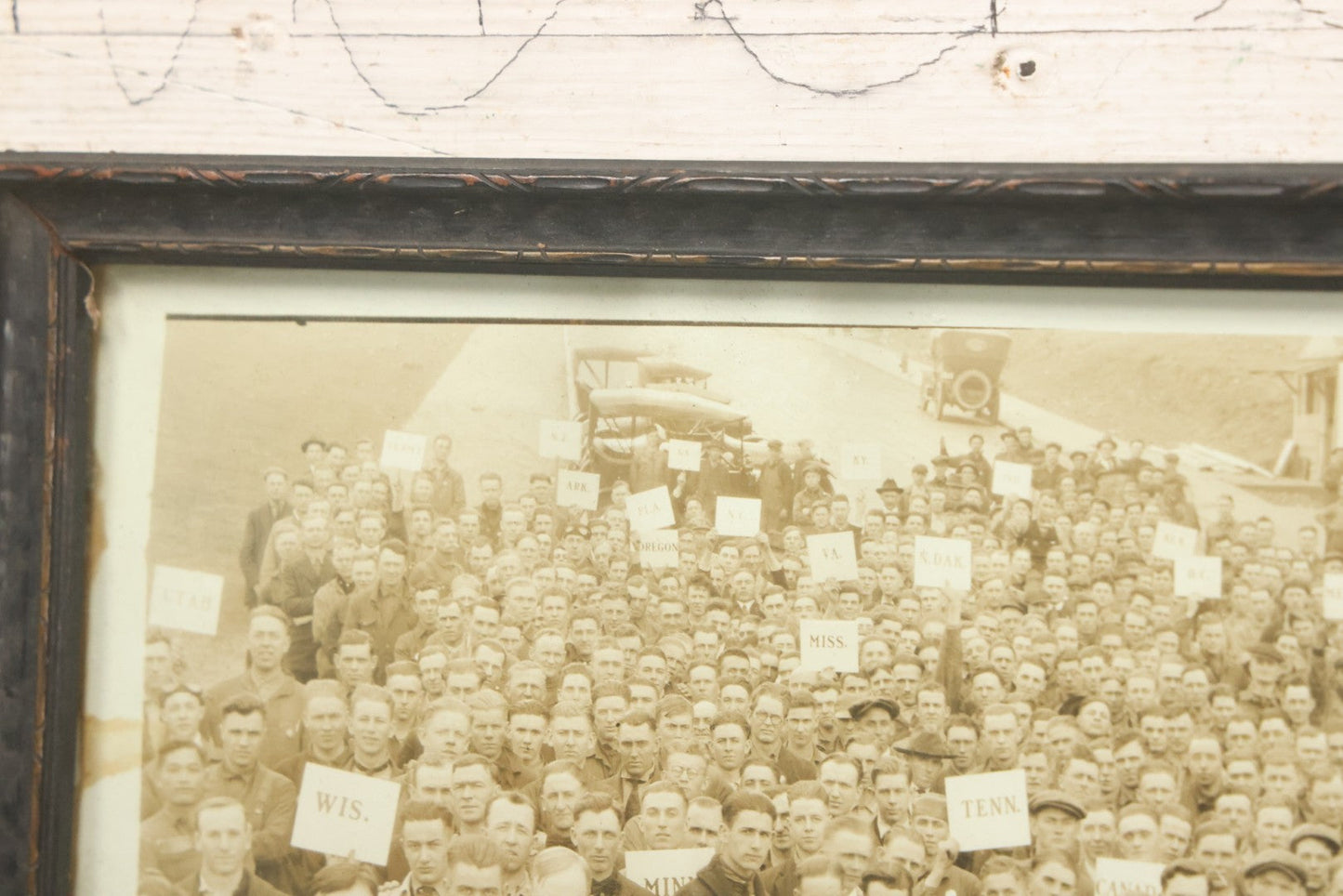 Lot 009 - Antique Framed "Yard-Long" Group Photograph Of The Students Of Sweeney Auto School, April 14th, 1921, Photo Taken By Riederer, Kansas City, Missouri, Note Texas Man On Motorcycle, 21" x 9-1/4"