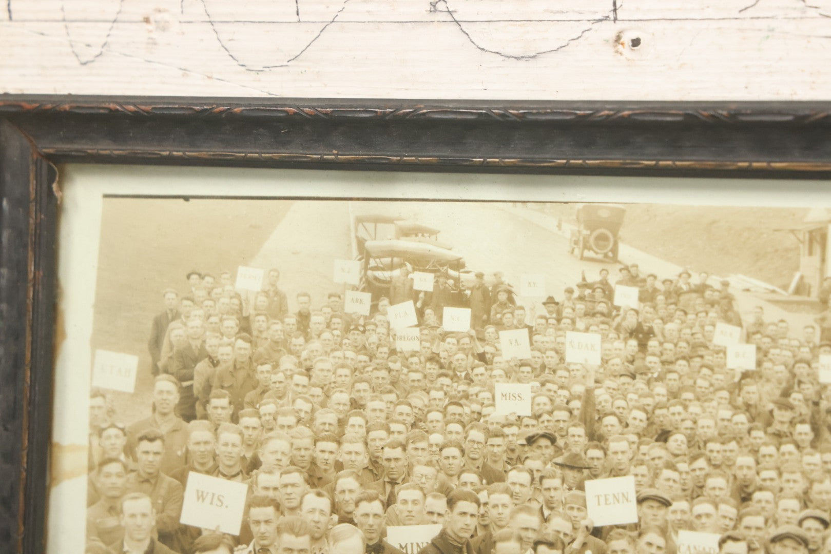 Lot 009 - Antique Framed "Yard-Long" Group Photograph Of The Students Of Sweeney Auto School, April 14th, 1921, Photo Taken By Riederer, Kansas City, Missouri, Note Texas Man On Motorcycle, 21" x 9-1/4"