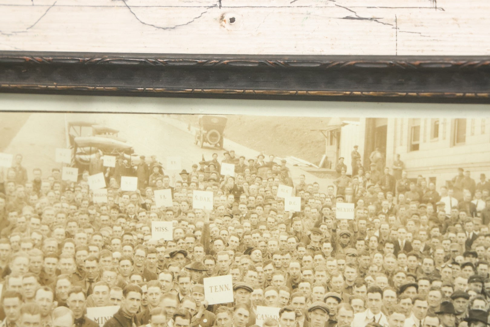 Lot 009 - Antique Framed "Yard-Long" Group Photograph Of The Students Of Sweeney Auto School, April 14th, 1921, Photo Taken By Riederer, Kansas City, Missouri, Note Texas Man On Motorcycle, 21" x 9-1/4"