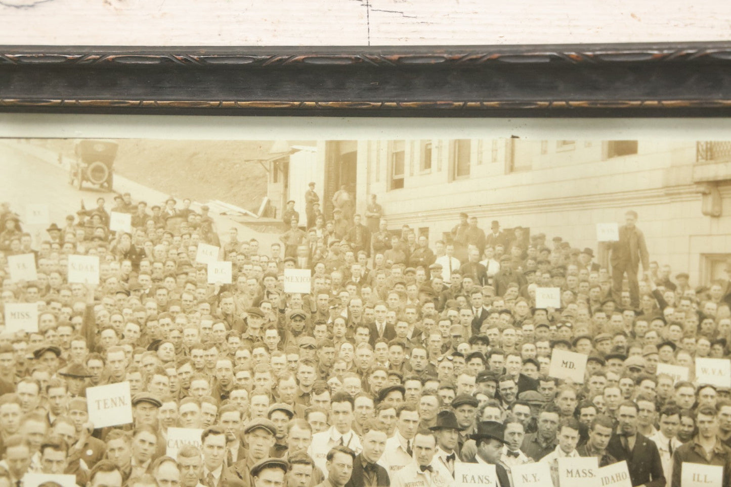 Lot 009 - Antique Framed "Yard-Long" Group Photograph Of The Students Of Sweeney Auto School, April 14th, 1921, Photo Taken By Riederer, Kansas City, Missouri, Note Texas Man On Motorcycle, 21" x 9-1/4"