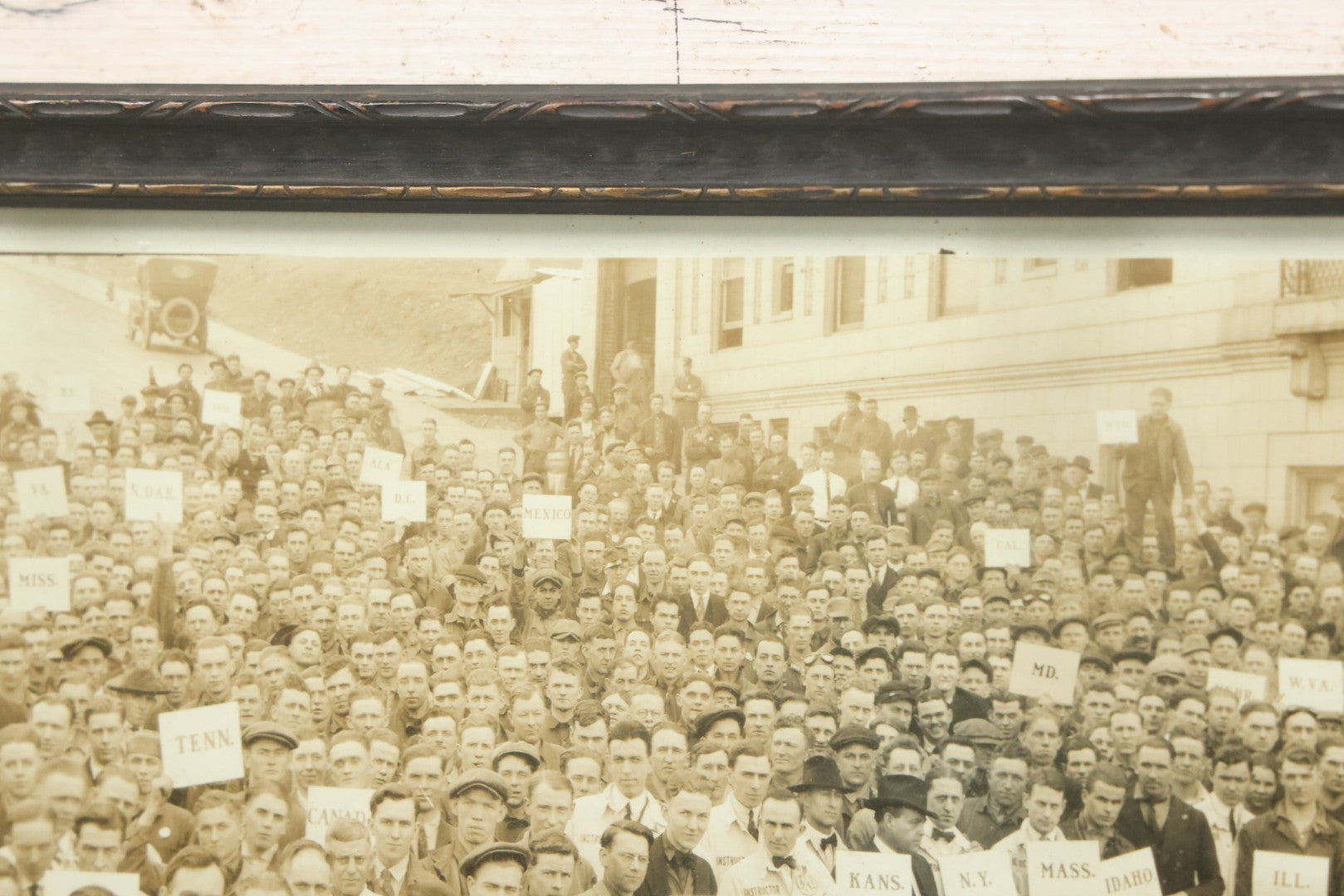 Lot 009 - Antique Framed "Yard-Long" Group Photograph Of The Students Of Sweeney Auto School, April 14th, 1921, Photo Taken By Riederer, Kansas City, Missouri, Note Texas Man On Motorcycle, 21" x 9-1/4"