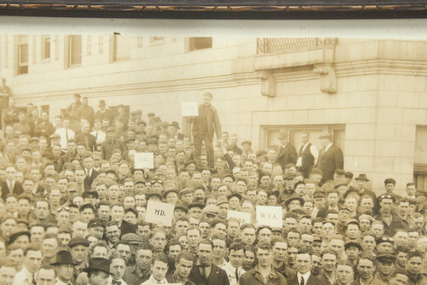 Lot 009 - Antique Framed "Yard-Long" Group Photograph Of The Students Of Sweeney Auto School, April 14th, 1921, Photo Taken By Riederer, Kansas City, Missouri, Note Texas Man On Motorcycle, 21" x 9-1/4"