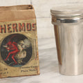 Lot 048 - Antique Thermos Brand Thermo Cup Set Of Four Plain Nickel Cups No. 79, With Original Box With Devil Graphics, Manufactured By The American Thermos Bottle Co., New York, Patented 1912, Complete Set