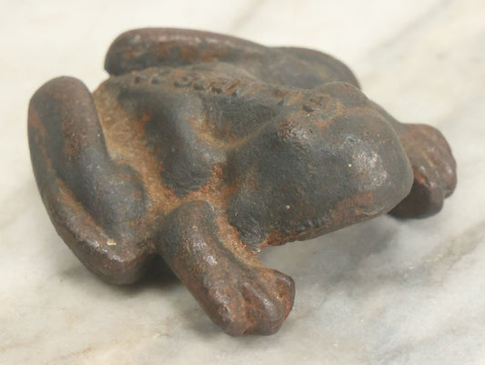 Lot 068 - Vintage Cast Iron Anatomically Incorrect Frog Paperweight With Female Genitalia And Breasts, Manufactured By C.I. Apps Co.