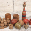 Lot 035 - Miscellaneous Grouping Of Vintage And Antique Carved Wooden Toys Including Balls, Cups, Game Pieces, And Tops, 15+ Pieces
