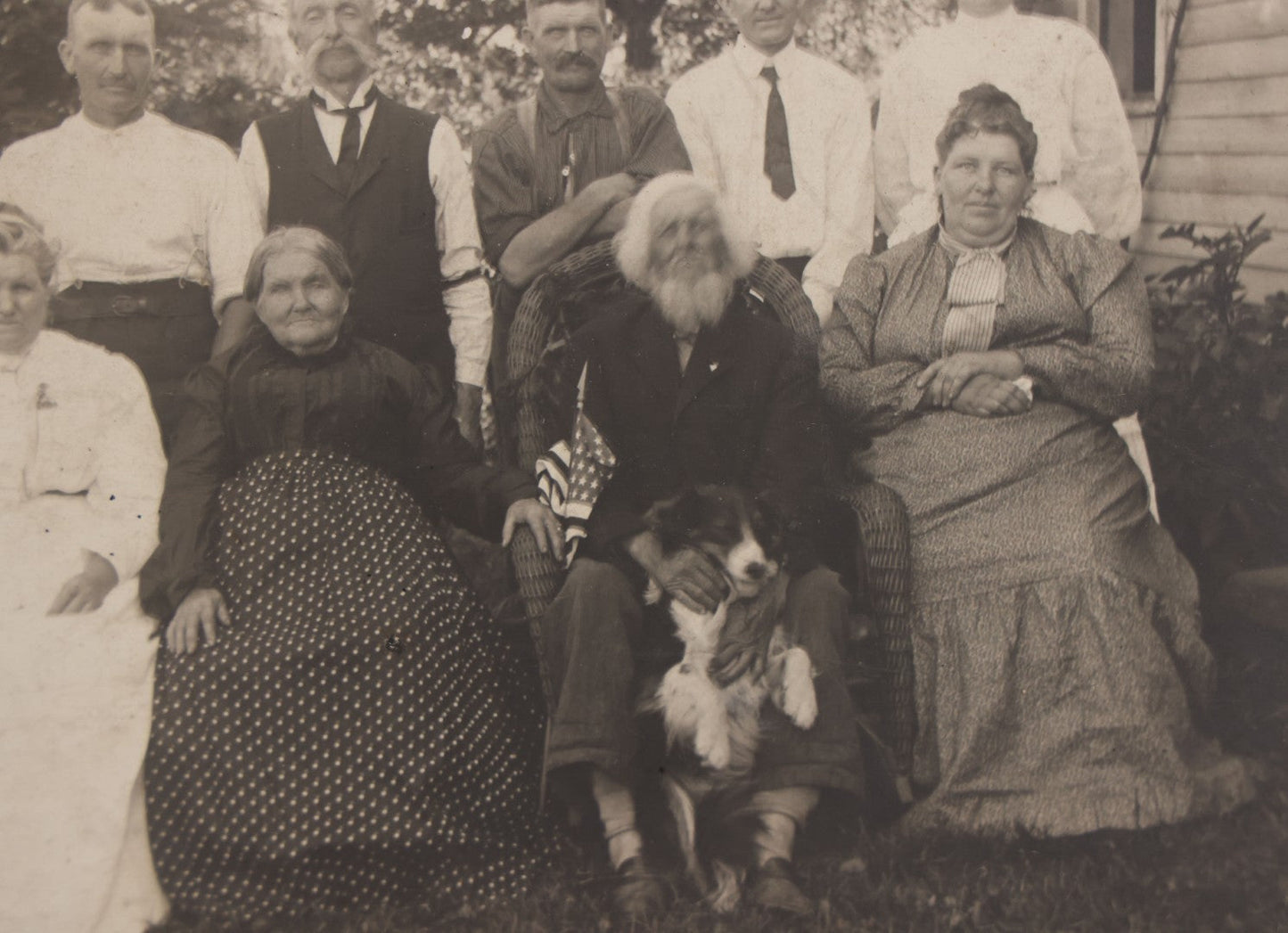 Lot 081 - Antique Boarded Photograph Of Family Gathering Including An Elderly Man Holding Border Collie Dog With American Flag
