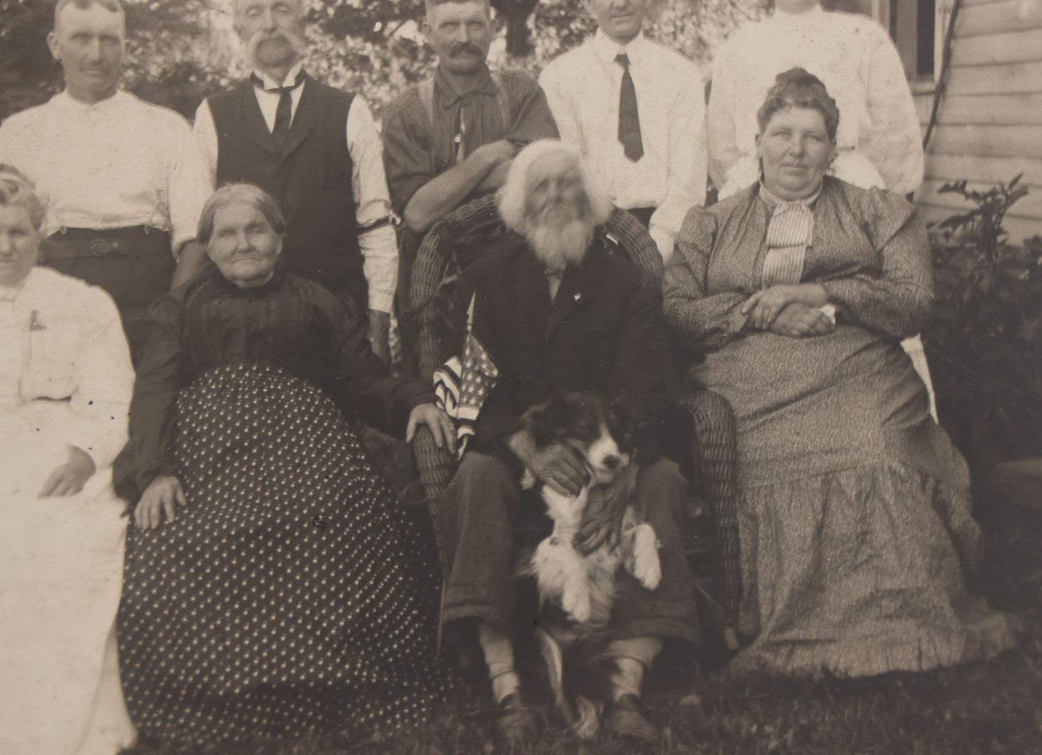 Lot 081 - Antique Boarded Photograph Of Family Gathering Including An Elderly Man Holding Border Collie Dog With American Flag