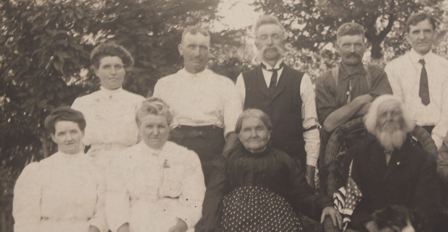 Lot 081 - Antique Boarded Photograph Of Family Gathering Including An Elderly Man Holding Border Collie Dog With American Flag
