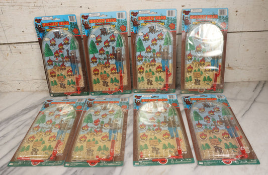 Lot 089 - Grouping Of Eight New Old Stock N.O.S. Smokey Bear "Put Out The Fires..." Pinball Game, Manufactured By Gordy International, Inc., Plainfield, New Jersey, No. 476, Made In China