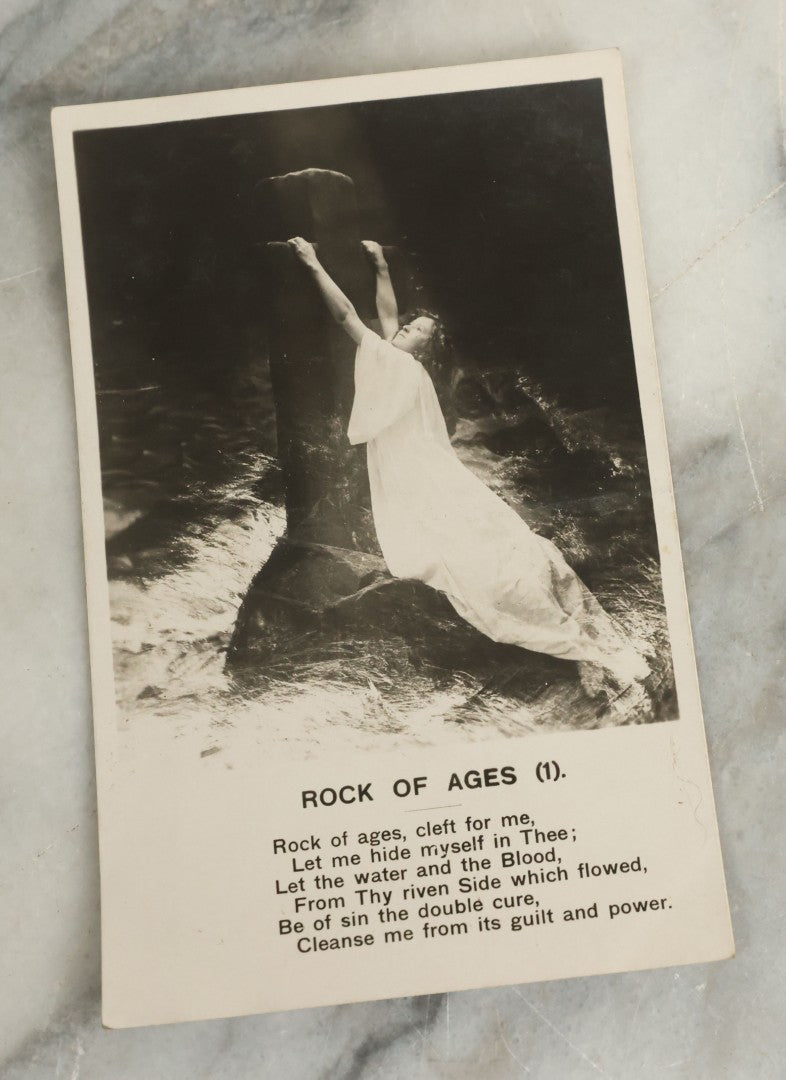 Lot 097 - Grouping Of 35 Antique Photographic Postcards From Bamforth's "Life Model Series," England And New York City, With Many Posed Studio Photographs And Series Including Rock Of Ages, The Little Hero, Excelsior, And Others