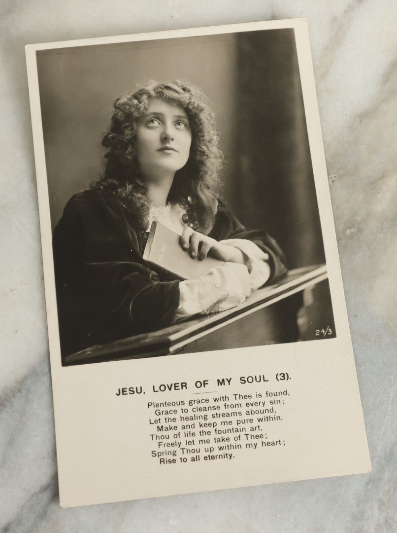 Lot 097 - Grouping Of 35 Antique Photographic Postcards From Bamforth's "Life Model Series," England And New York City, With Many Posed Studio Photographs And Series Including Rock Of Ages, The Little Hero, Excelsior, And Others