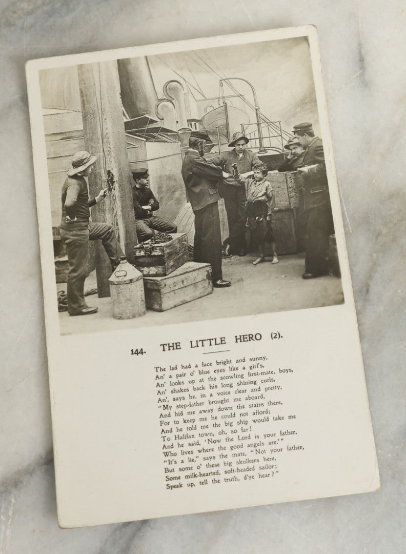 Lot 097 - Grouping Of 35 Antique Photographic Postcards From Bamforth's "Life Model Series," England And New York City, With Many Posed Studio Photographs And Series Including Rock Of Ages, The Little Hero, Excelsior, And Others