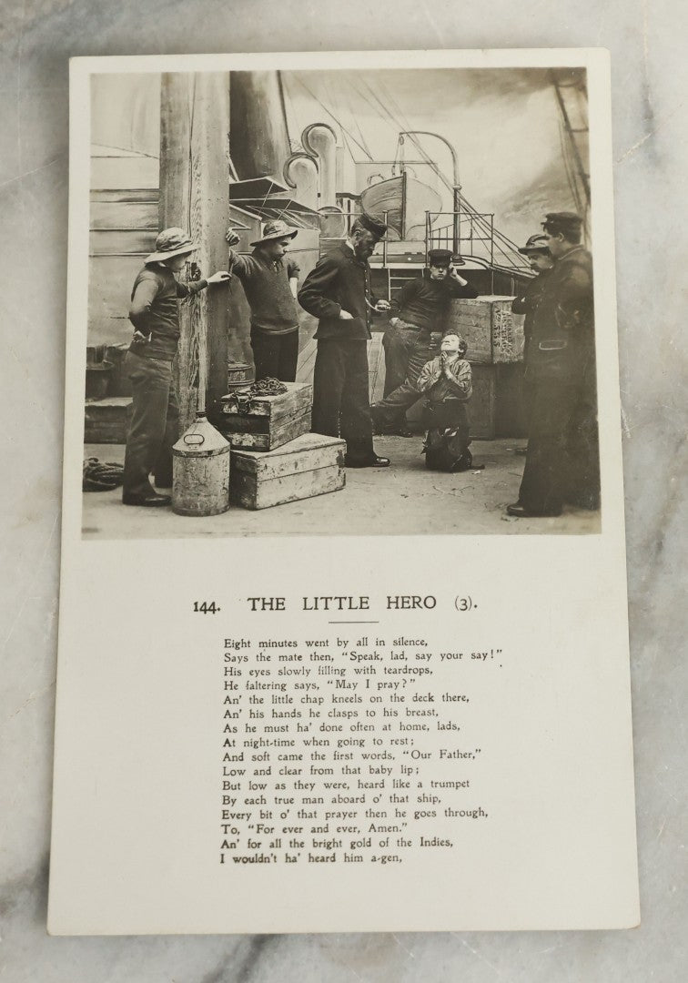 Lot 097 - Grouping Of 35 Antique Photographic Postcards From Bamforth's "Life Model Series," England And New York City, With Many Posed Studio Photographs And Series Including Rock Of Ages, The Little Hero, Excelsior, And Others