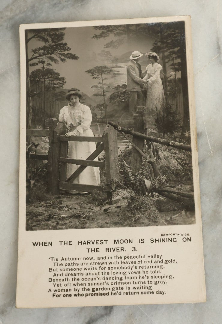 Lot 097 - Grouping Of 35 Antique Photographic Postcards From Bamforth's "Life Model Series," England And New York City, With Many Posed Studio Photographs And Series Including Rock Of Ages, The Little Hero, Excelsior, And Others