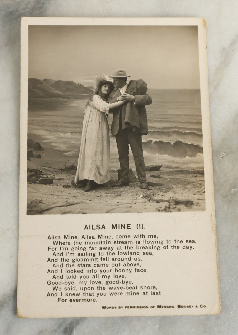 Lot 097 - Grouping Of 35 Antique Photographic Postcards From Bamforth's "Life Model Series," England And New York City, With Many Posed Studio Photographs And Series Including Rock Of Ages, The Little Hero, Excelsior, And Others
