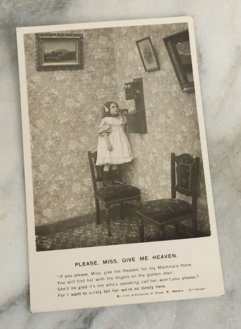 Lot 097 - Grouping Of 35 Antique Photographic Postcards From Bamforth's "Life Model Series," England And New York City, With Many Posed Studio Photographs And Series Including Rock Of Ages, The Little Hero, Excelsior, And Others