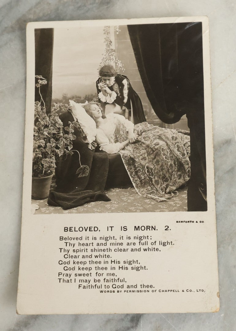 Lot 097 - Grouping Of 35 Antique Photographic Postcards From Bamforth's "Life Model Series," England And New York City, With Many Posed Studio Photographs And Series Including Rock Of Ages, The Little Hero, Excelsior, And Others