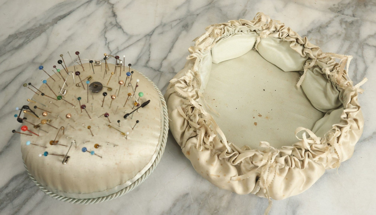 Lot 104 - Vintage Large Size Pincushion With White Silk And Dozens Of Antique With Dozens Of Glass Ball Head Sewing Pins, As Found
