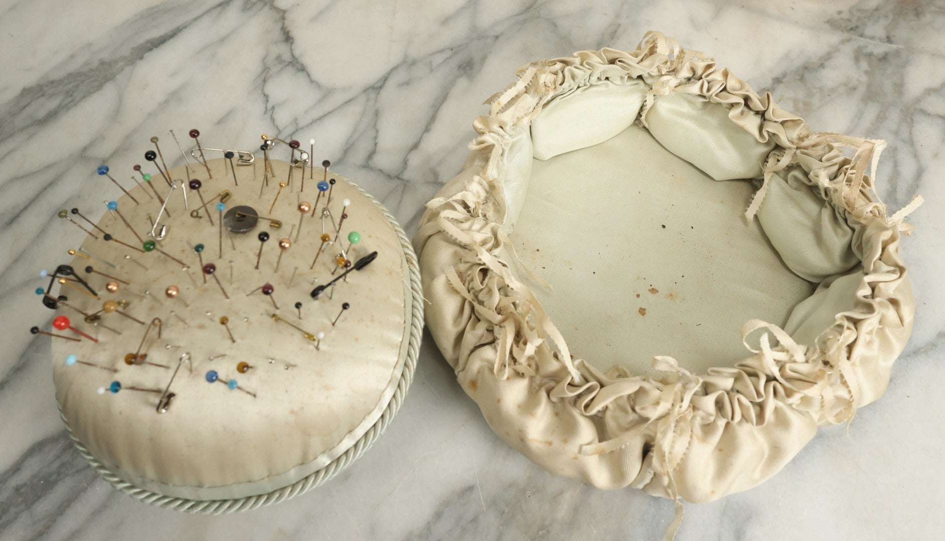 Lot 104 - Vintage Large Size Pincushion With White Silk And Dozens Of Antique With Dozens Of Glass Ball Head Sewing Pins, As Found