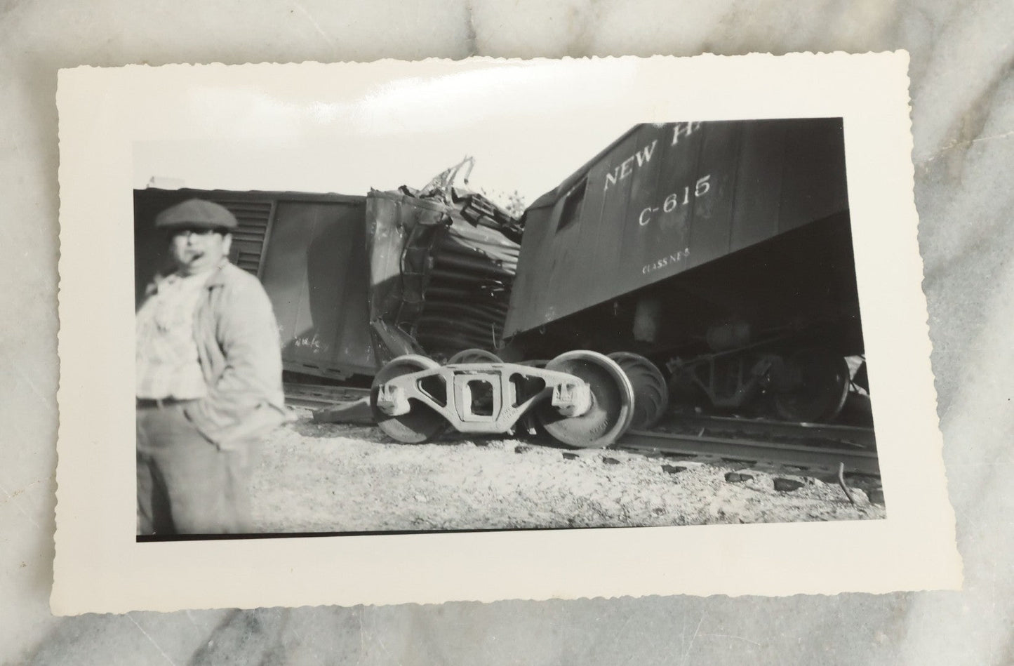 Lot 107 - Grouping Of Five Vintage Snapshot Photographs Showing A Railroad Collision And Derailment With A New Haven Caboose And A Locomotive With Trust Bridge Visible In Background, Circa 1940