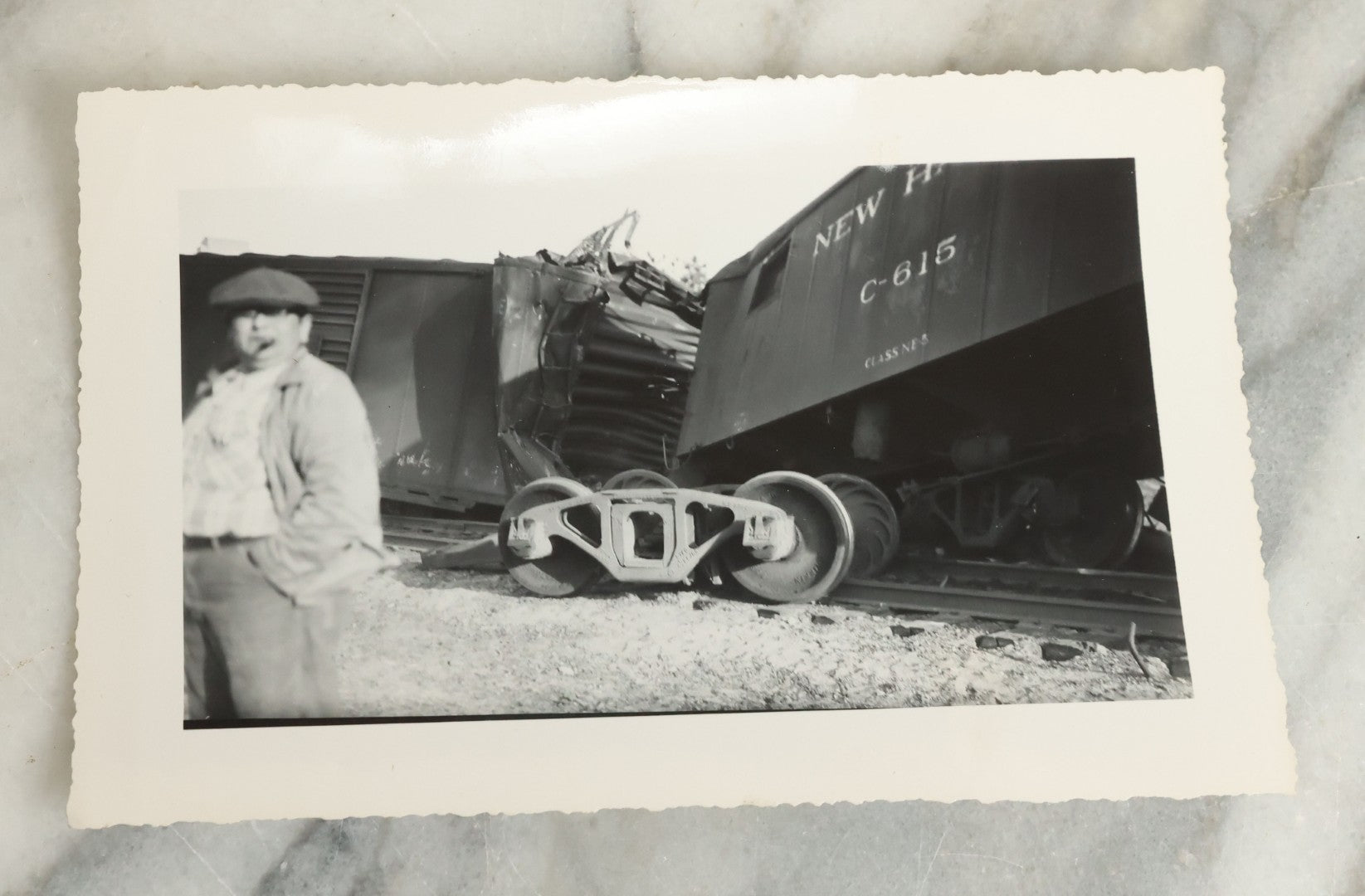 Lot 107 - Grouping Of Five Vintage Snapshot Photographs Showing A Railroad Collision And Derailment With A New Haven Caboose And A Locomotive With Trust Bridge Visible In Background, Circa 1940