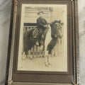 Lot 109 - Vintage Boarded Photograph Of Young Boy With Bowl Cut Riding A Brown And White Pony In Vintage Frame, 5-1/8" x 7-1/8"