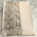 Lot 113 - Vintage Large Format Glossy Photograph Of Men Climbing Ladder On Brick Tower, Likely Firefighter Training Related
