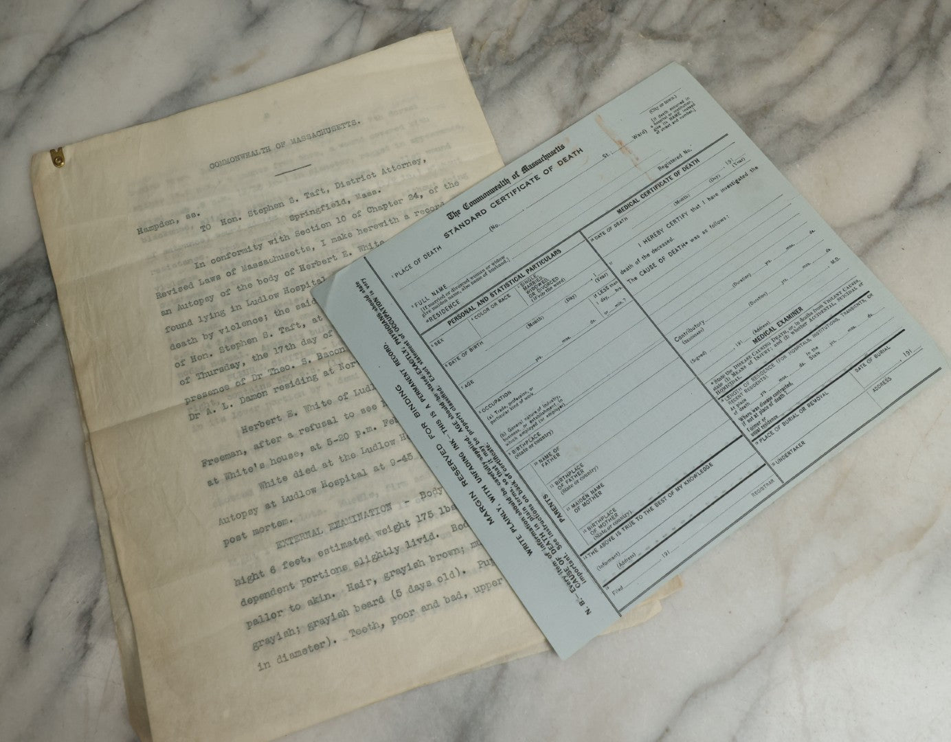 Lot 115 - Two Piece Ephemera Grouping Including Typewritten Medical Examiners Autopsy Report Of A Violent Death, Addressed To District Attorney Stephen S. Taft, Springfield, Massachusetts, Signed Everett A. Bates, Dated 1910, And Blank Death Certificate
