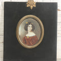 Lot 118 - Antique Hand Colored Cameo Print Of Woman In Red Blouse And Brown Hair In Ebony Wood Frame With Brass Acorn Hanger And Adornments