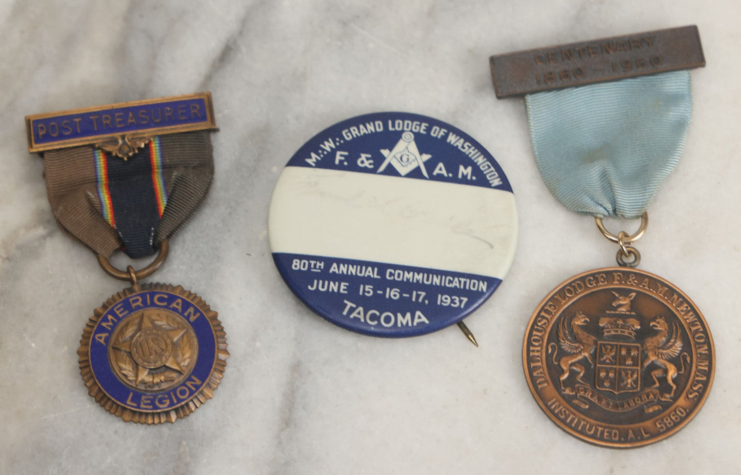 Lot 127 - Three Piece Fraternal Grouping Including Dalhousie Masonic Lodge Badge, 1960, American Legion Post Treasurer Badge, And Tacoma Washington Masonic Pinback Button, 1937